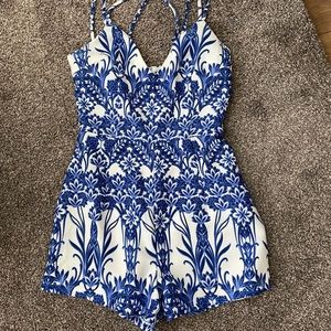 Blue & white Missguided romper. Never worn.